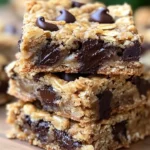 Delicious 5-ingredient oatmeal chocolate chip bars on a wooden table