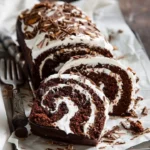 Chocolate Almond Cream Cake Roll with chocolate frosting and almond filling