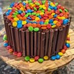 Chocolate M&M Celebration Cake with colorful M&Ms on top