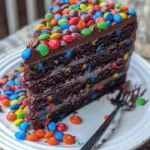 Chocolate M&M Celebration Cake decorated with vibrant M&Ms