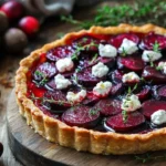 Cranberry and roasted beet tart showcasing vibrant colors and unique flavors.