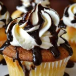 Delicious Boston Cream Pie Cupcakes topped with creamy frosting and chocolate glaze