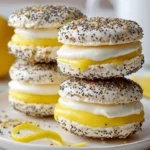 Lemon and poppy seed meringue sandwiches on a decorative plate