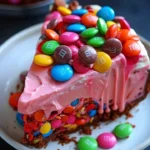 Pink Paradise No-Bake M&M and Toffee Cheesecake with vibrant toppings