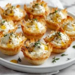 Savory lavender honey cheesecake bites with feta crust on a plate