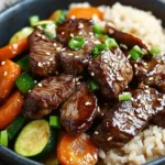 Savory steak and veggie stir-fry served in a bowl with colorful ingredients