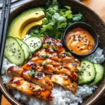 Spicy Honey-Ginger Chicken Bowls topped with Yum Yum Sauce