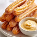 Delicious sweet potato churros with salted caramel goat cheese dip