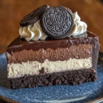 Ultimate triple chocolate cheesecake with Oreo crust and fudge topping