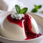 White Burrata Panna Cotta with liquid raspberry core dessert